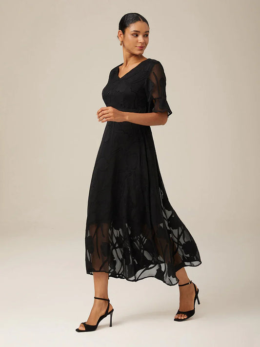 Maxikleid mit Rüschen und flatternder Spitze