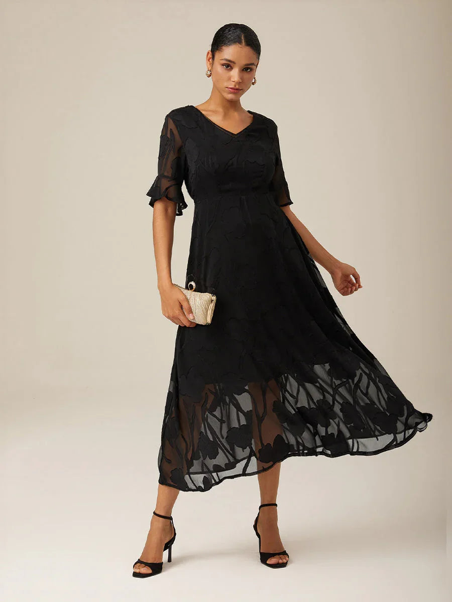 Maxikleid mit Rüschen und flatternder Spitze