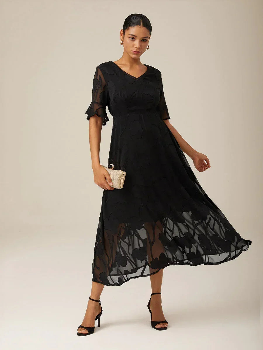 Maxikleid mit Rüschen und flatternder Spitze