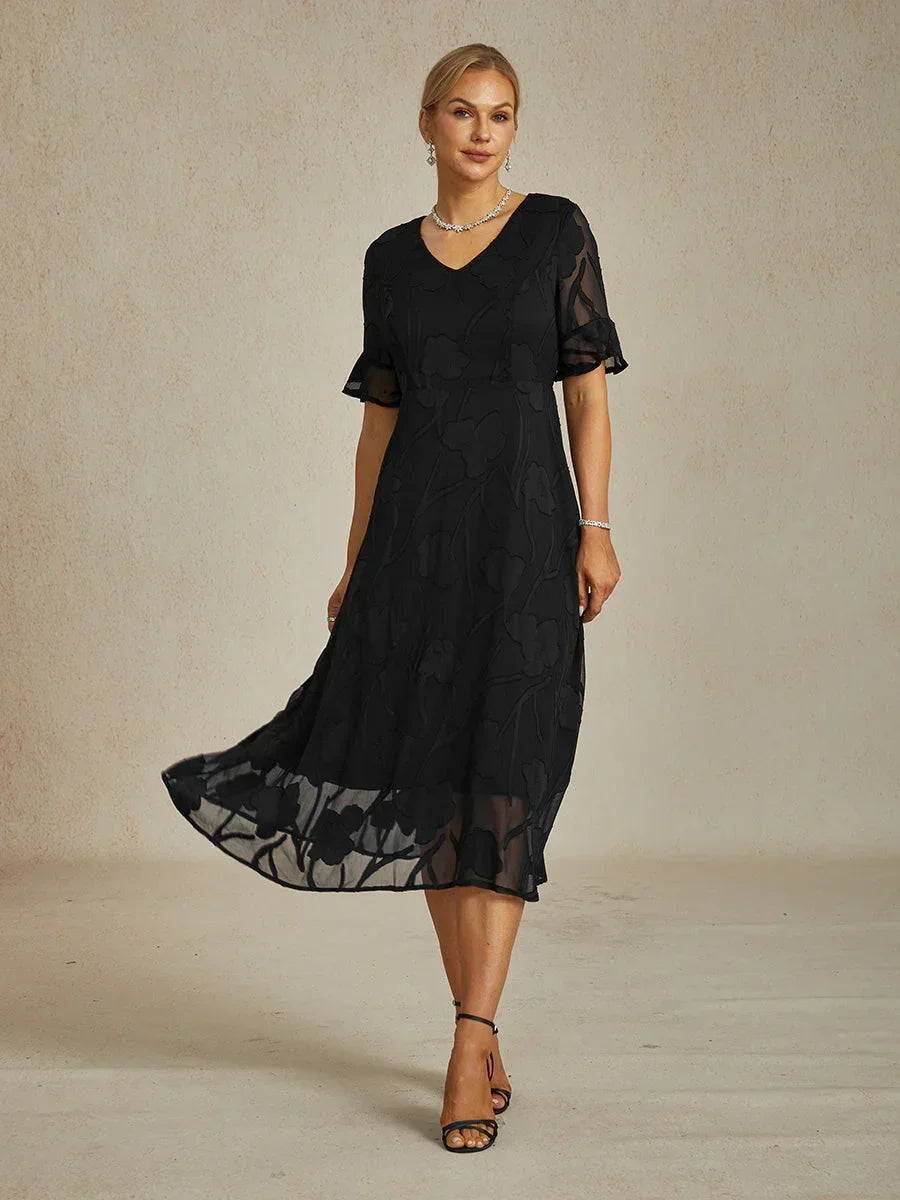 Maxikleid mit Rüschen und flatternder Spitze