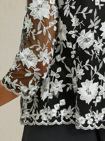 Spitzenjacke mit Blumenstickerei und Muscheldetail