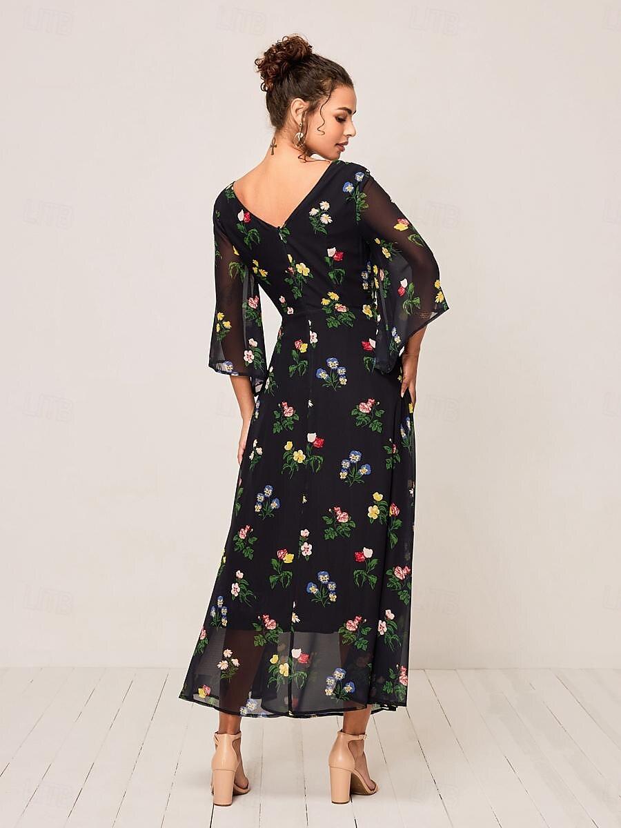 Robe longue fleurie à nœud torsadé