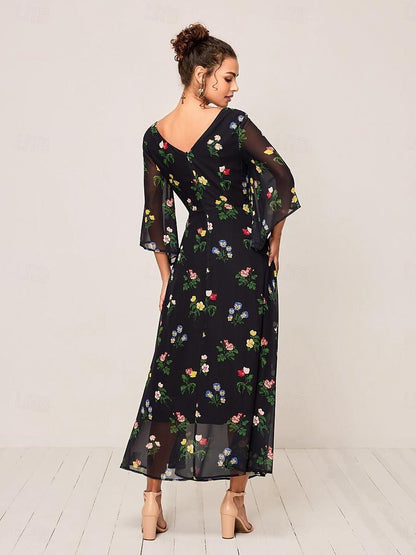 Robe longue fleurie à nœud torsadé