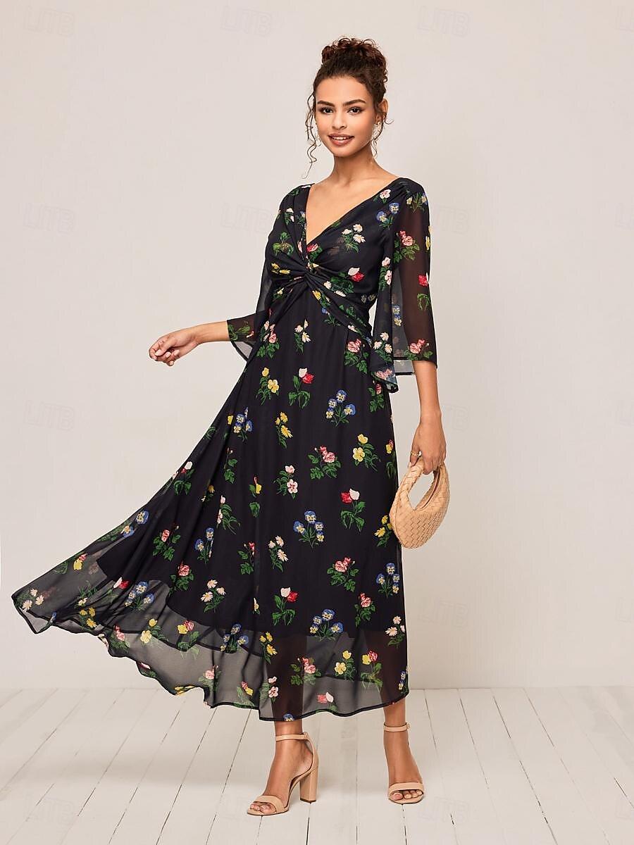 Robe longue fleurie à nœud torsadé