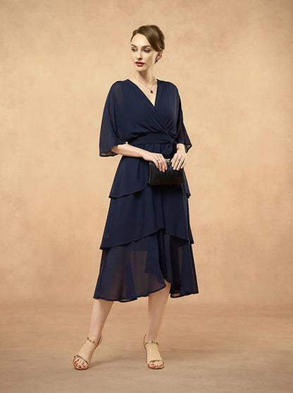 Robe en mousseline à volants superposés et col en V
