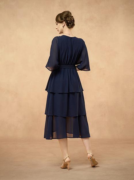 Robe en mousseline à volants superposés et col en V