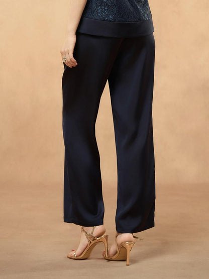Pantalon uni à jambe large et taille haute
