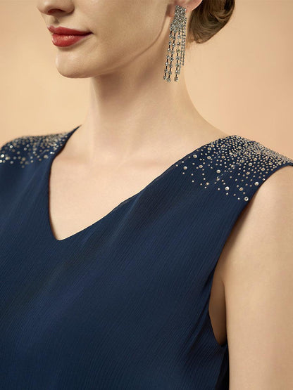Robe mi-longue en mousseline à volants