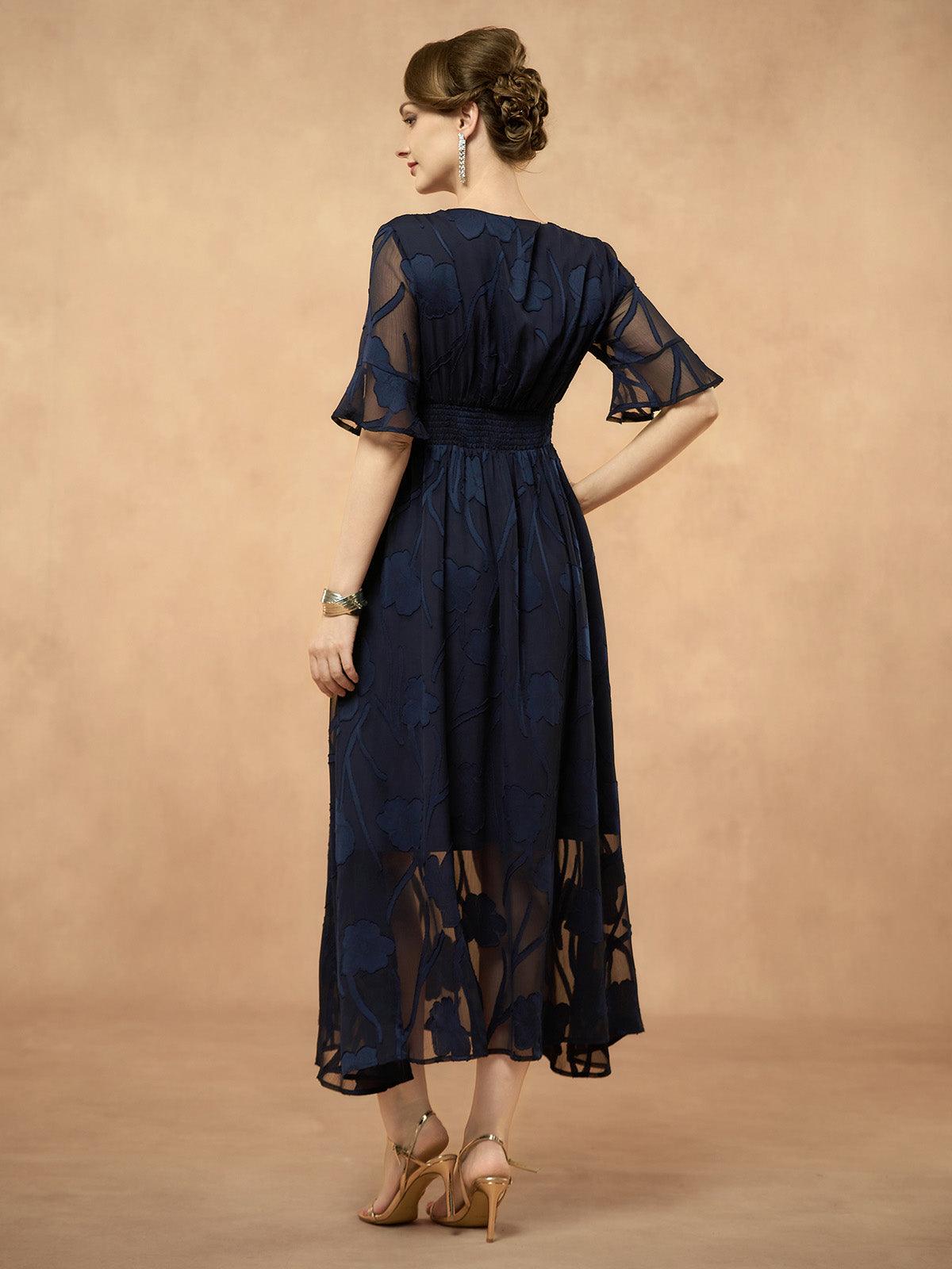 Robe longue en dentelle à volants