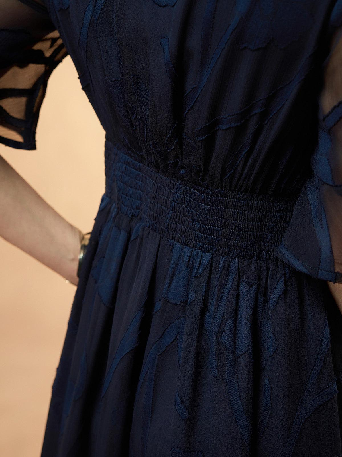 Robe longue en dentelle à volants
