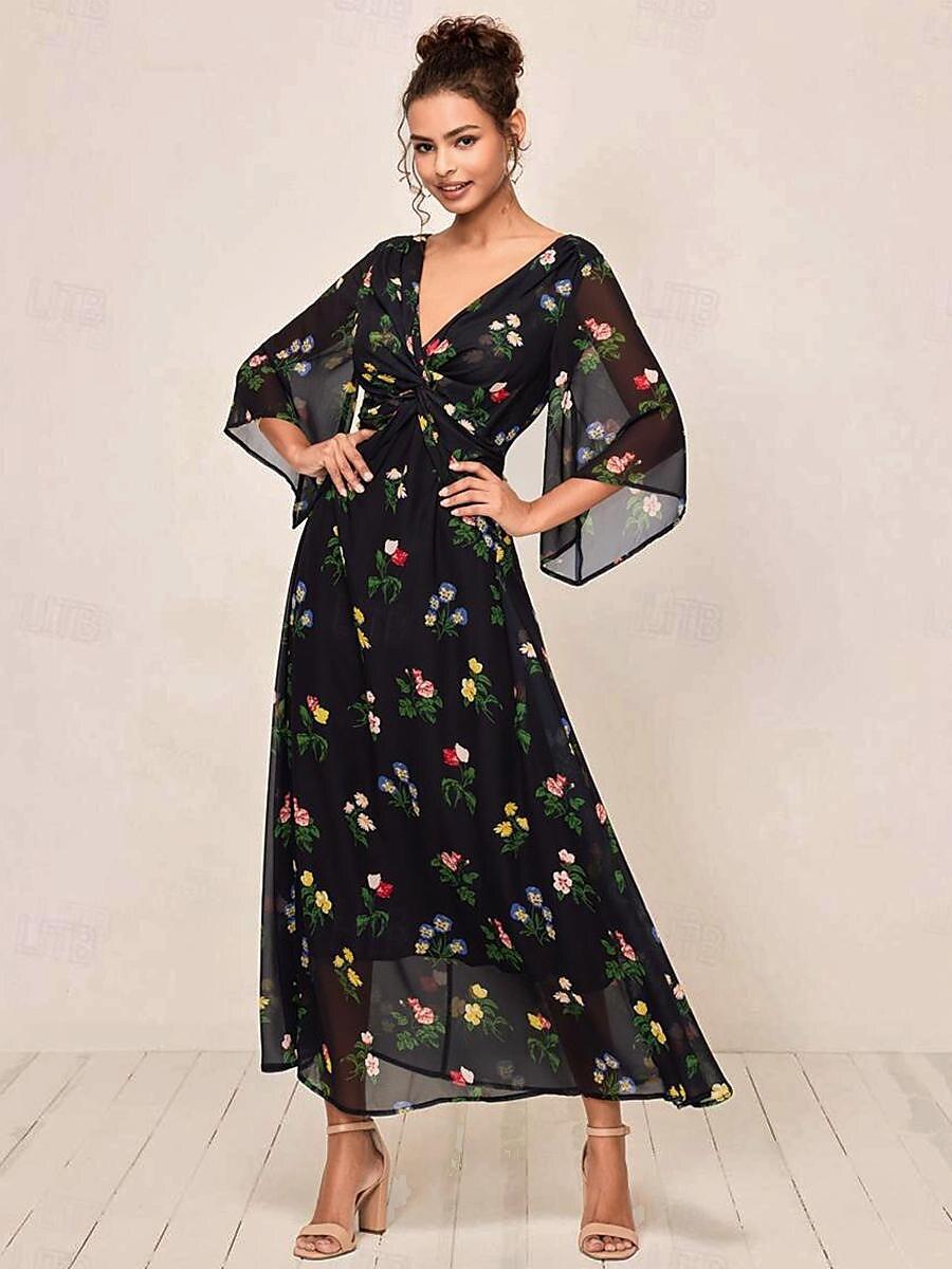 Robe longue fleurie à nœud torsadé