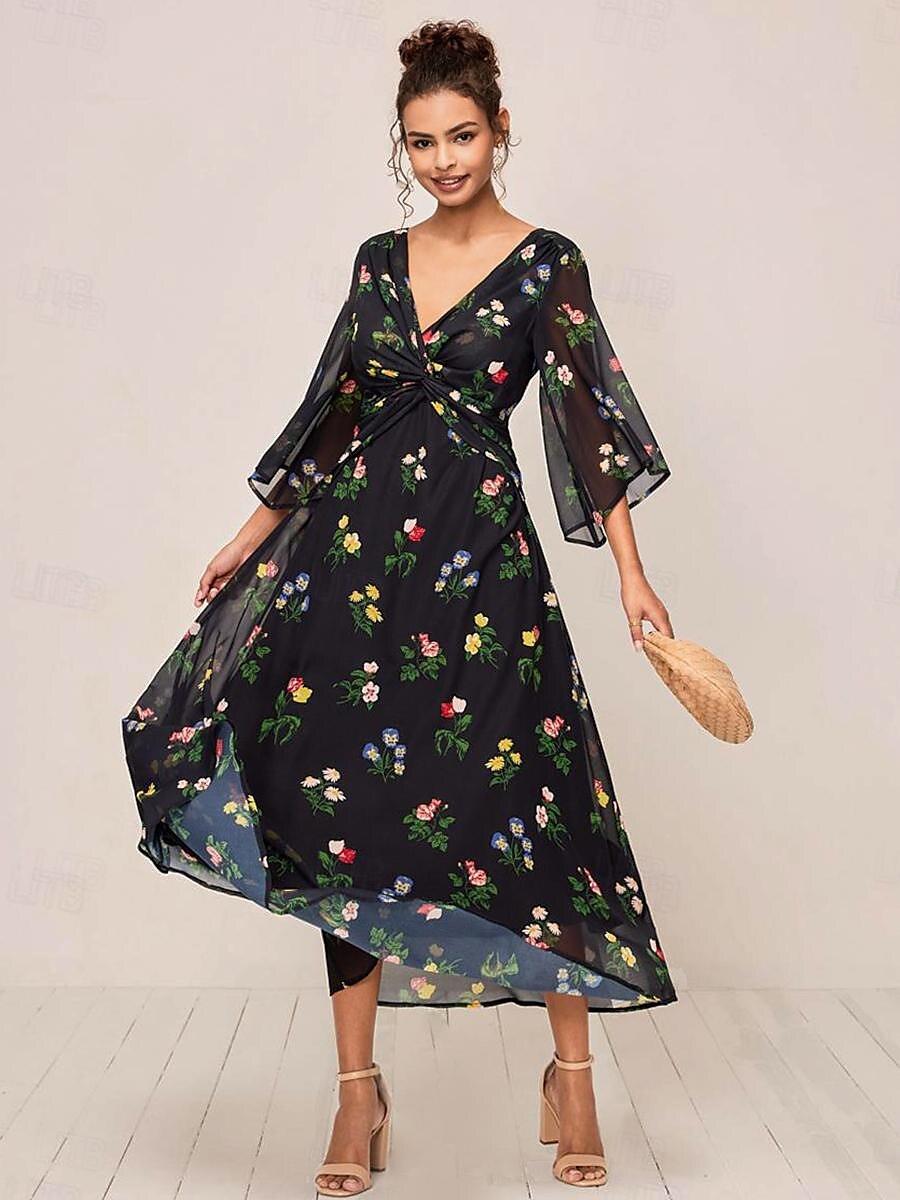 Robe longue fleurie à nœud torsadé