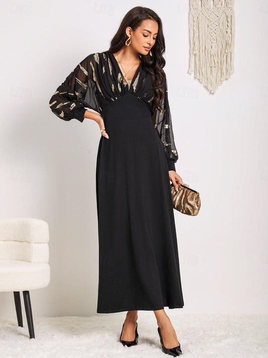 Robe longue noire à paillettes et manches bouffantes
