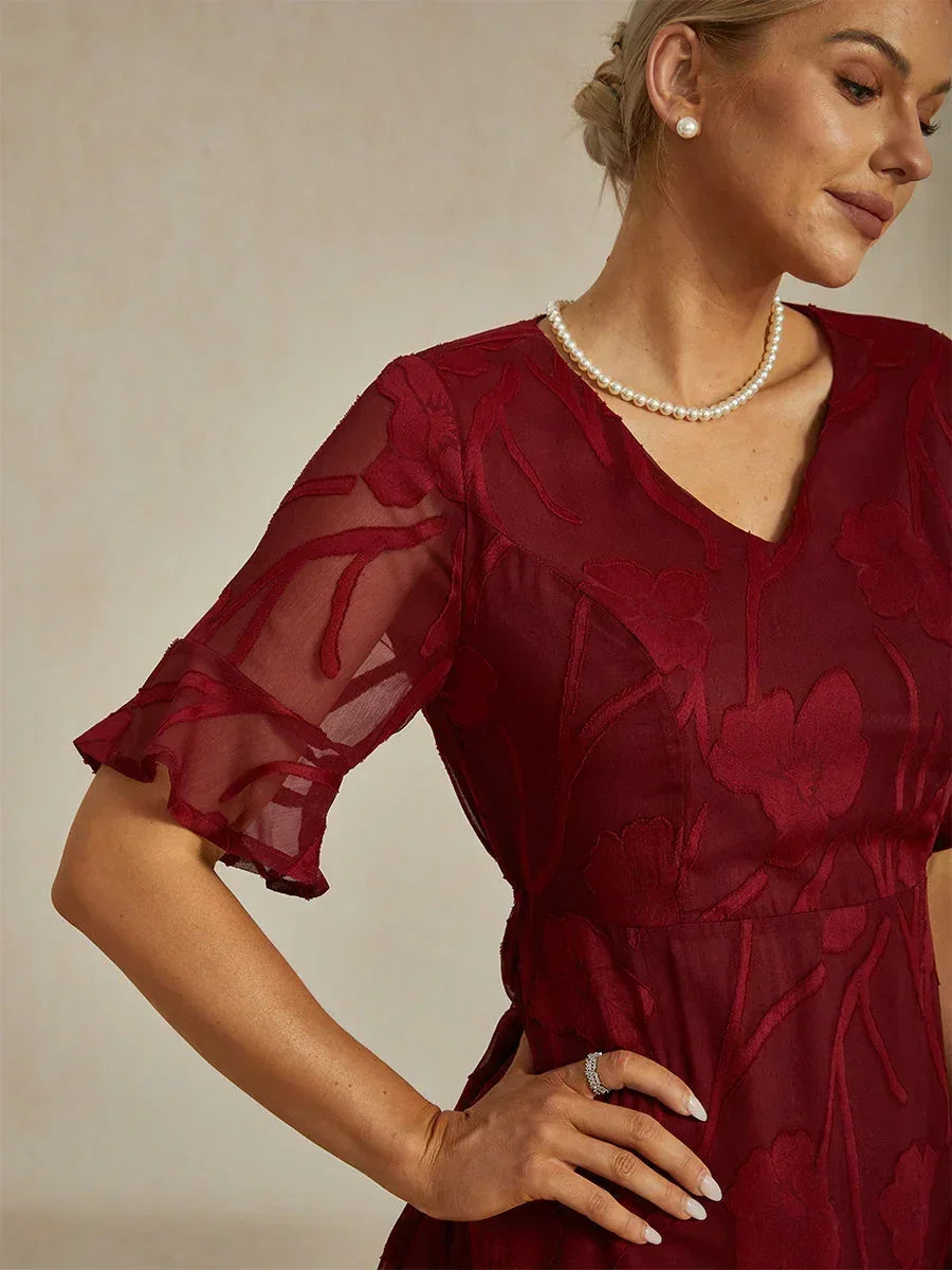 Maxikleid mit Rüschen und flatternder Spitze