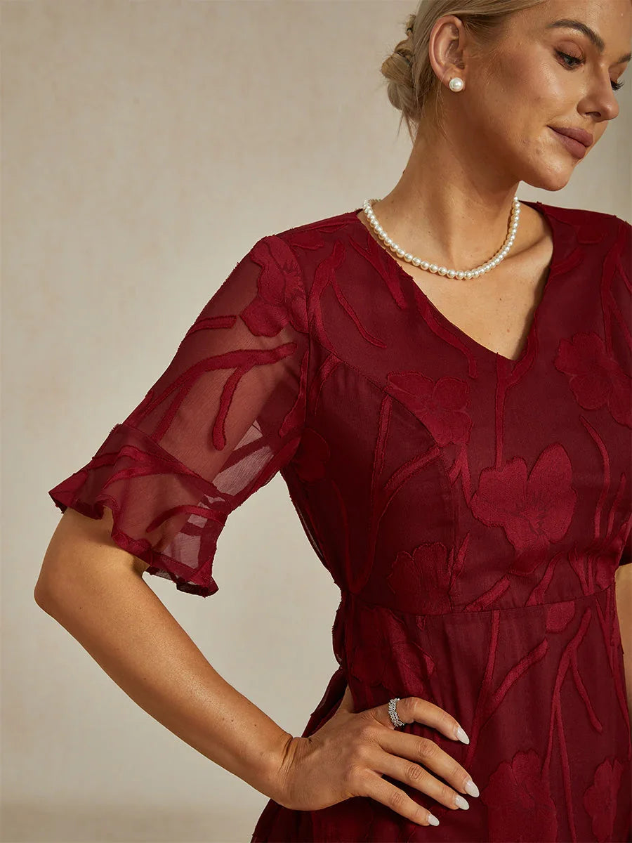 Maxikleid mit Rüschen und flatternder Spitze