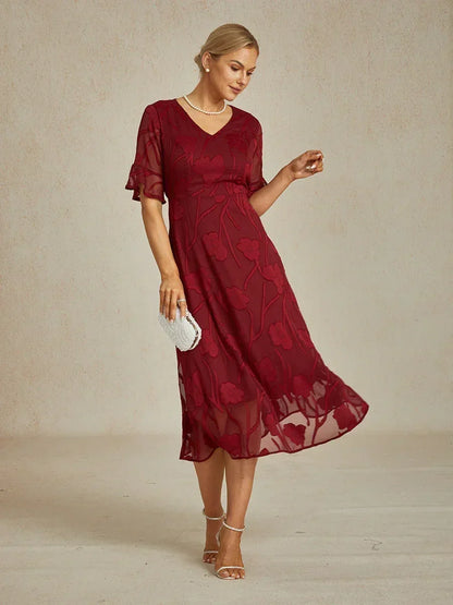 Maxikleid mit Rüschen und flatternder Spitze