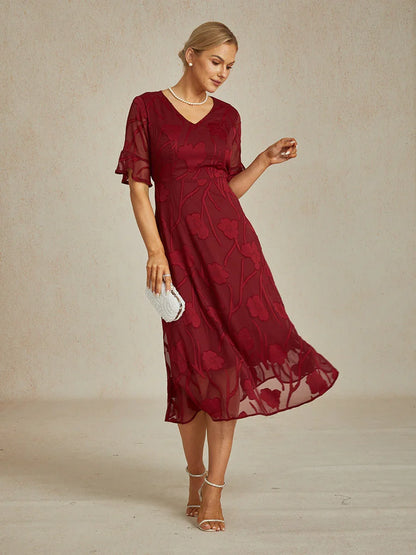 Maxikleid mit Rüschen und flatternder Spitze