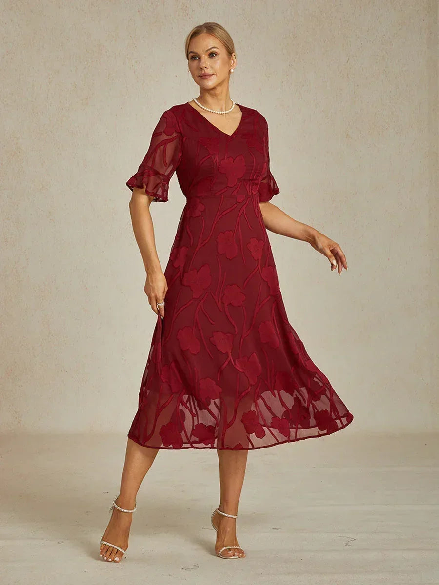 Maxikleid mit Rüschen und flatternder Spitze