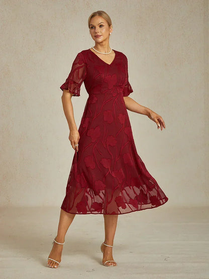 Maxikleid mit Rüschen und flatternder Spitze