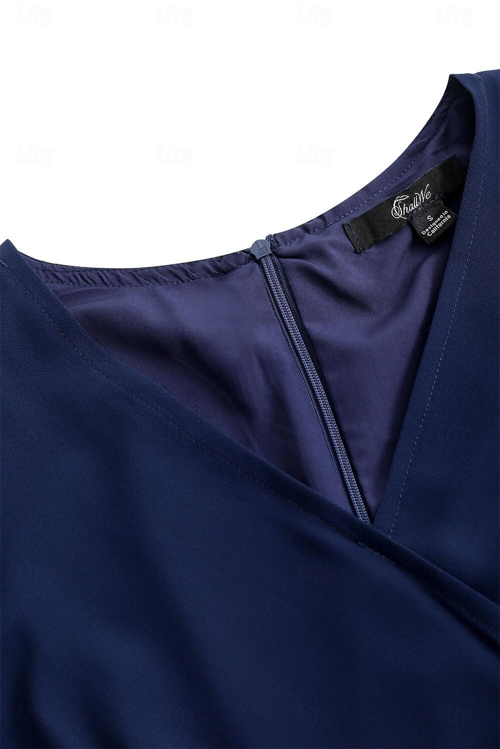Blaues Chiffonkleid mit Plissee und Rüschen